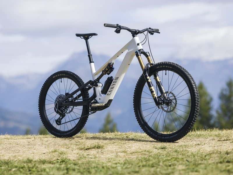 2027 Canyon Spectral:ON CF 9 eMTB with Avinox M2S motor on an alpine meadow