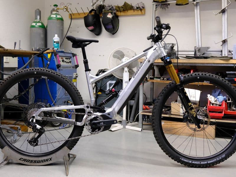 Crossworx Pace290 aluminium e-MTB in raw finish in the Crossworx workshop